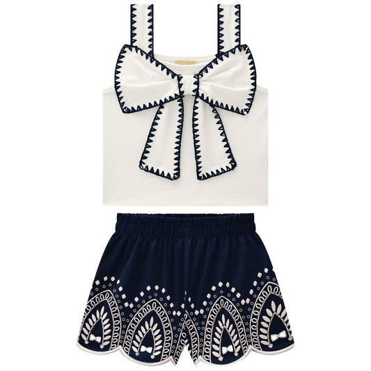 Conjunto polo big lazo con falda azul - Igorperu